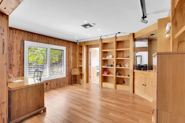 a view of a hallway with entryway