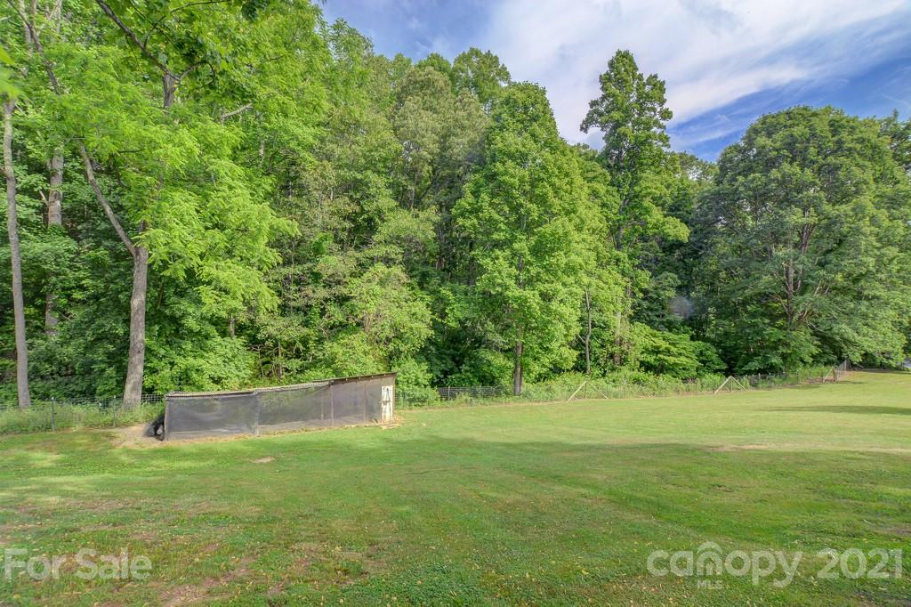 232 P P V Road Clyde, NC 28721 - Photo 21 of 22 a view of outdoor space with deck and yard