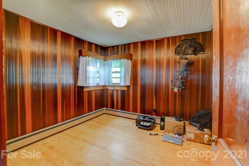 232 P P V Road Clyde, NC 28721 - Photo 7 of 22 an empty room with windows