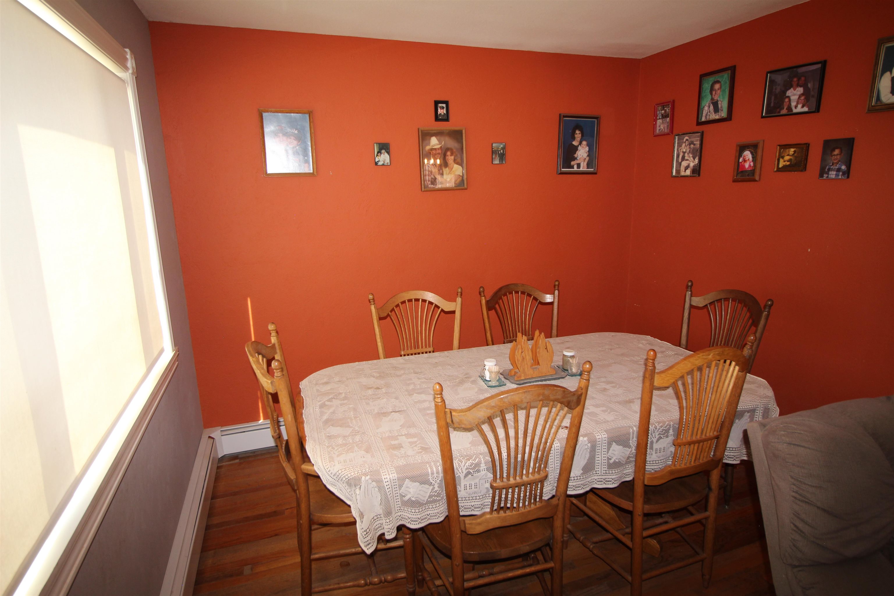 1150 East 7th Street Delta, CO 81416 - Photo 11 of 32 a dining room with furniture and wooden floor