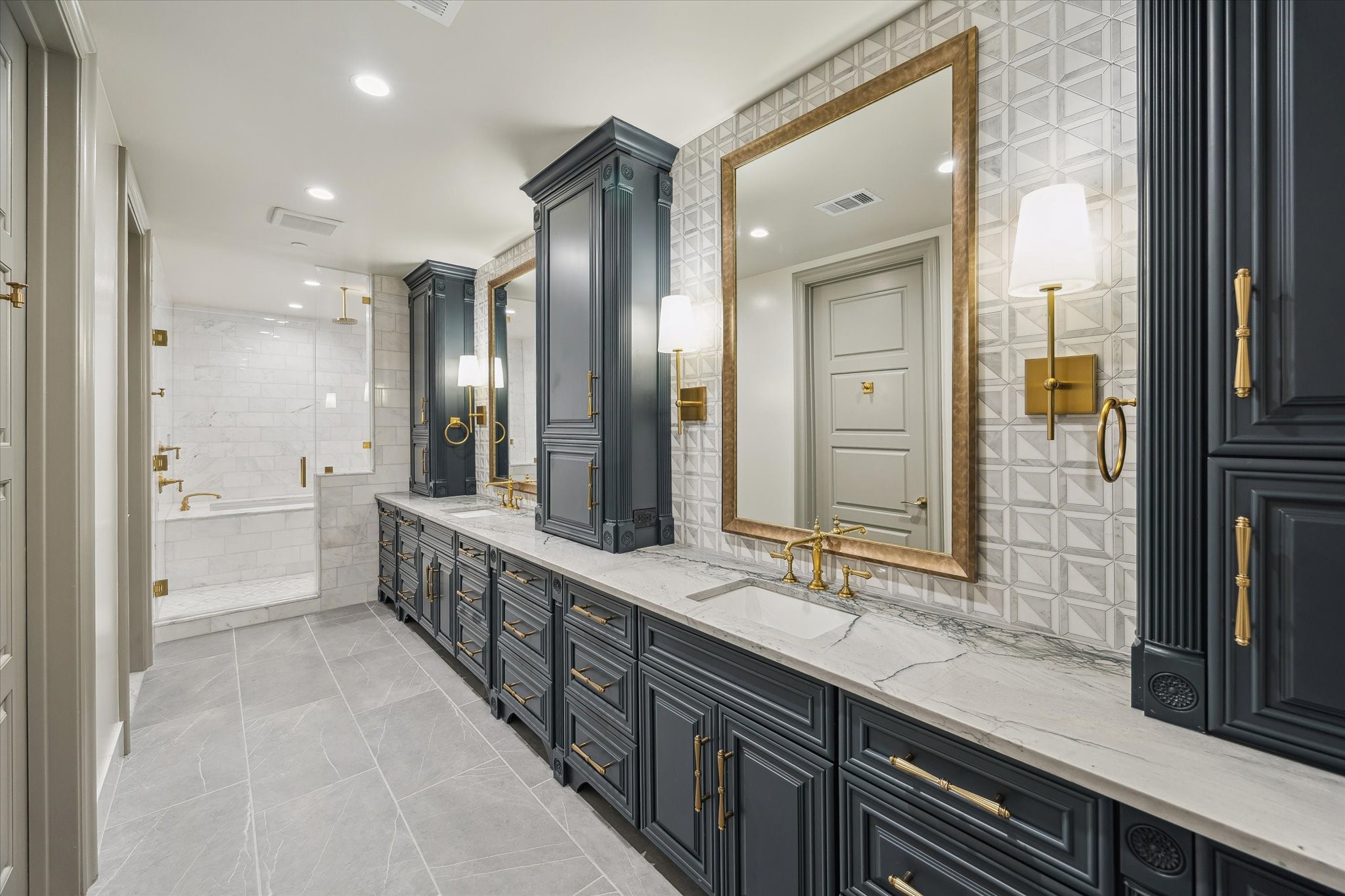 1717 Bissonnet Street, Unit 605 Houston, TX 77005 - Photo 15 of 32 a bathroom with a double vanity sink and a mirror