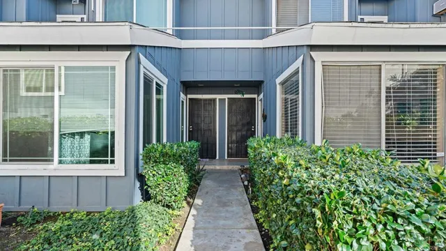 a view of entrance of house and yard