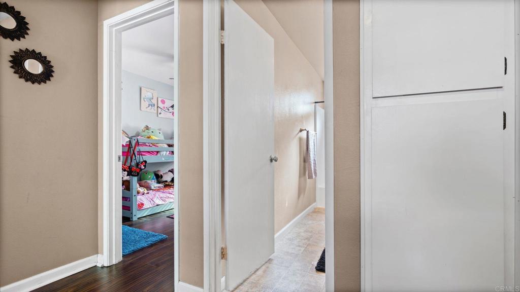 8146 Lemon Grove Way, Unit B Lemon Grove, CA 91945 - Photo 12 of 28 a view of a hallway with wooden floor