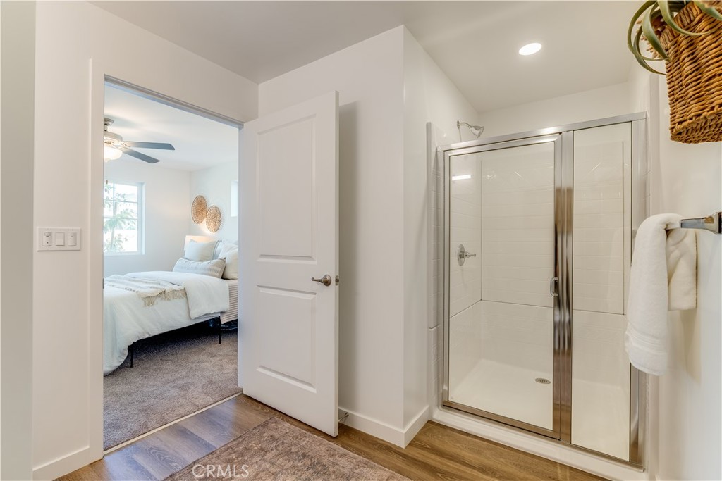 3802 Ranch House Road, Unit 103 San Luis Obispo, CA 93401 - Photo 4 of 9 a bathroom with a tub and shower