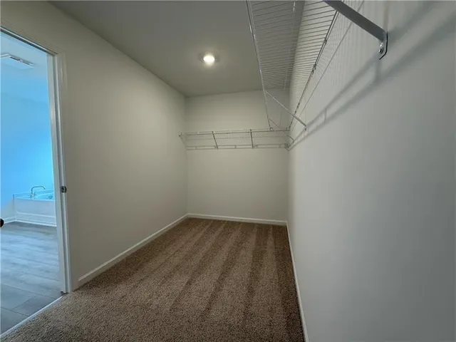 a view of a room with racks on the wall