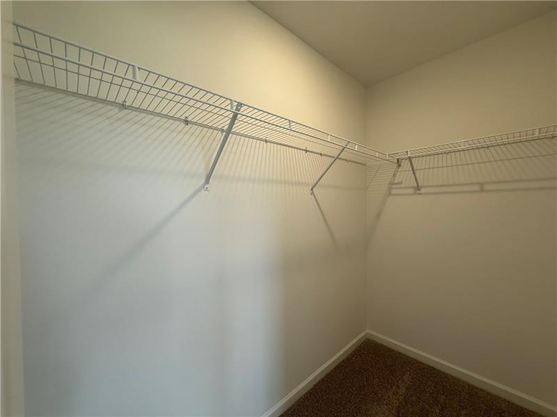 5449 Hargrove Way Flowery Branch, GA 30542 - Photo 32 of 39 a view of a rack on the wall