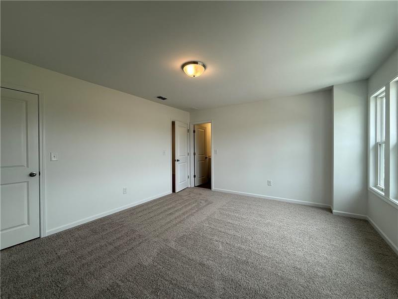 5449 Hargrove Way Flowery Branch, GA 30542 - Photo 37 of 39 a view of an empty room with a window