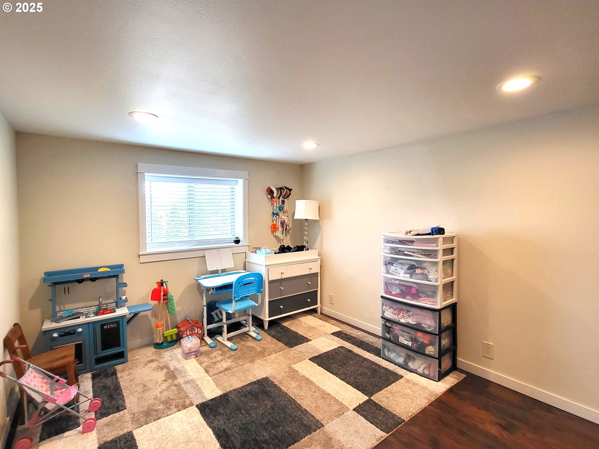1727 East Washington Avenue Cottage Grove, OR 97424 - Photo 12 of 20 a view of a workspace with furniture and a window