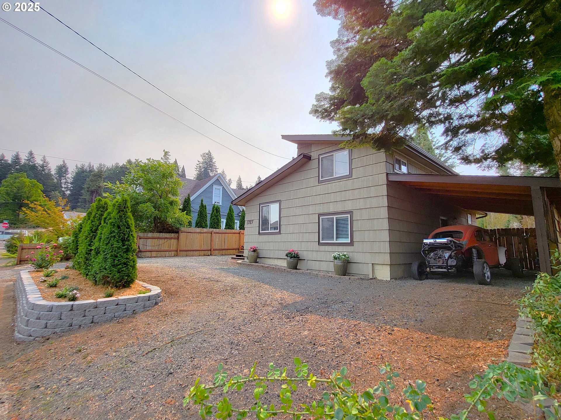 1727 East Washington Avenue Cottage Grove, OR 97424 - Photo 2 of 20 a view of a car parked in front of house