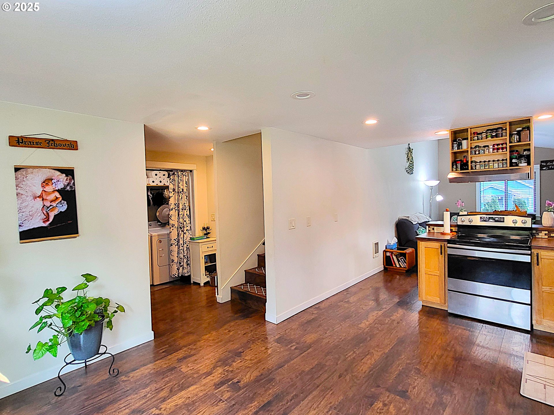 1727 East Washington Avenue Cottage Grove, OR 97424 - Photo 7 of 20 a view of a kitchen with furniture and wooden floor