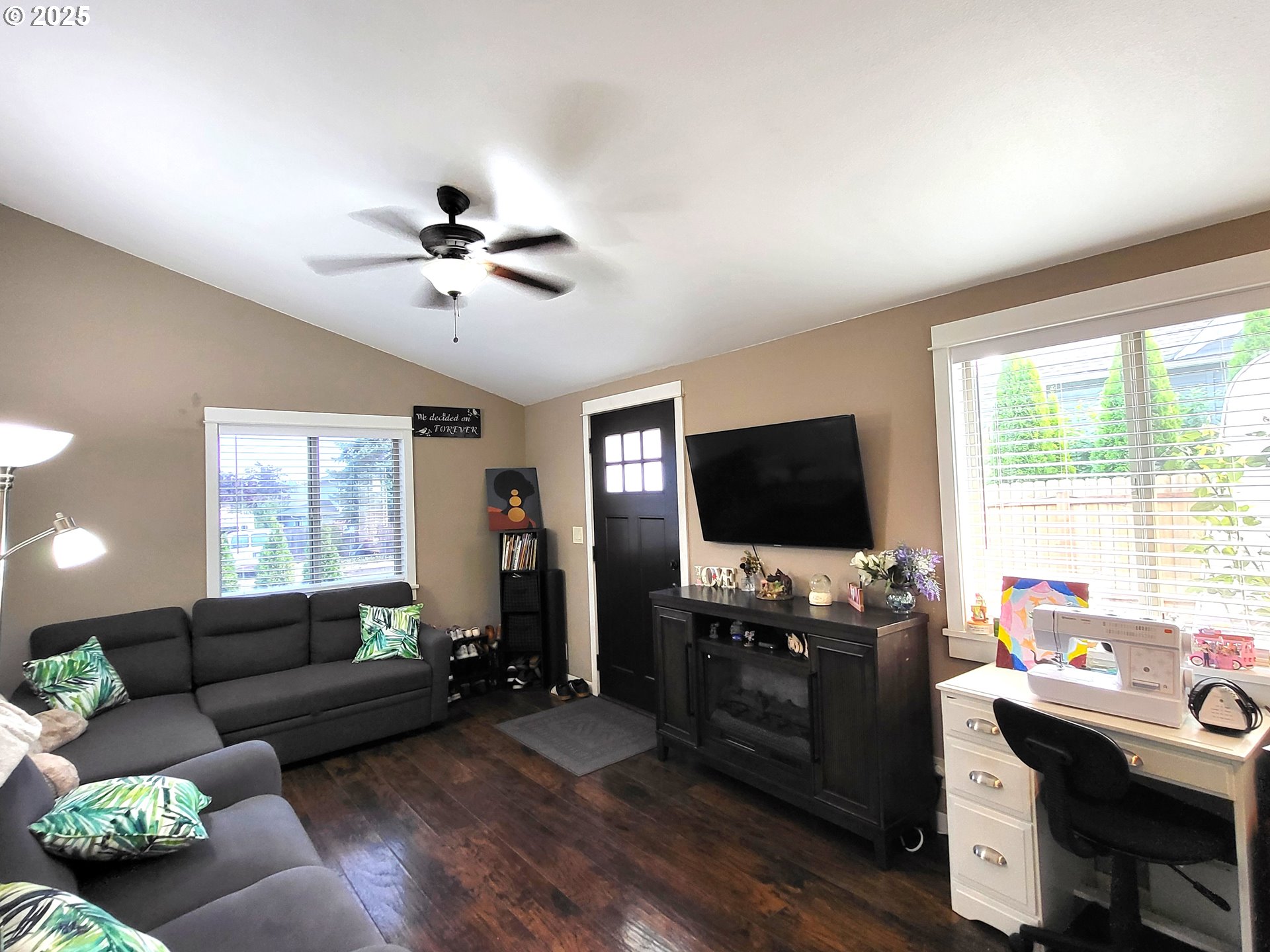 1727 East Washington Avenue Cottage Grove, OR 97424 - Photo 9 of 20 a living room with furniture and a flat screen tv