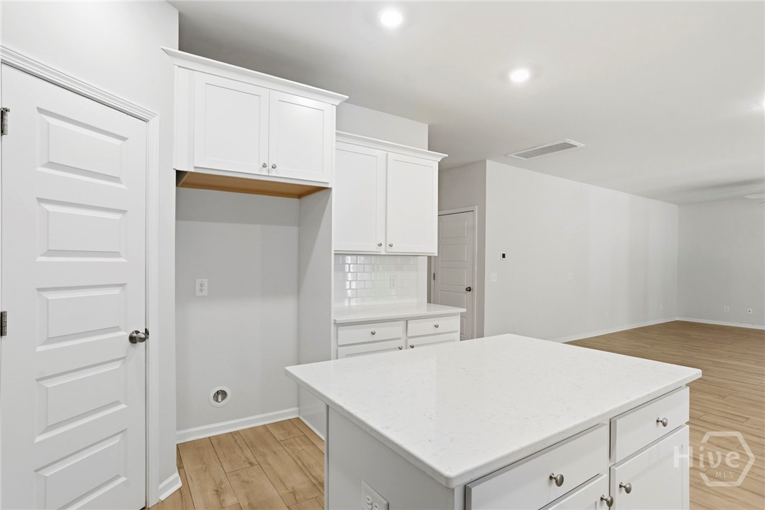 136 Binscombe Lane Pooler, GA 31322 - Photo 13 of 35 Pantry, Island, and Location of Refrigerator