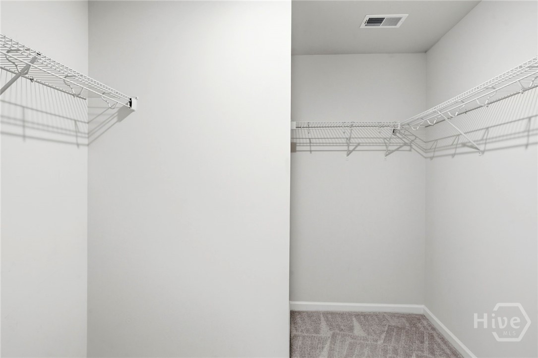 136 Binscombe Lane Pooler, GA 31322 - Photo 19 of 35 Owner's Suite Walk-In Closet