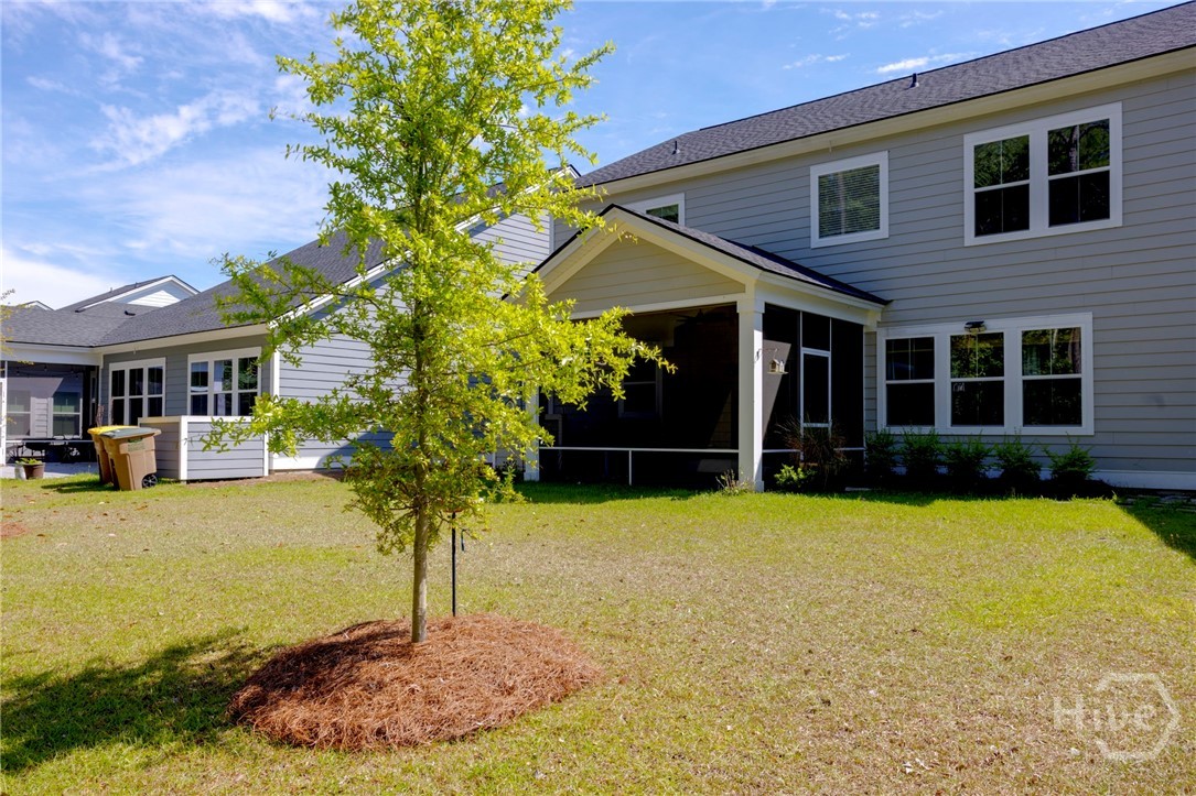 136 Binscombe Lane Pooler, GA 31322 - Photo 34 of 35 Backyard Side View of Home