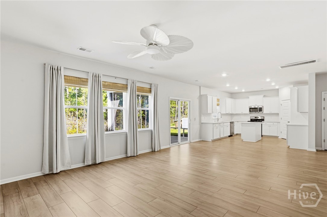 136 Binscombe Lane Pooler, GA 31322 - Photo 9 of 35 Family Room View to Kitchen