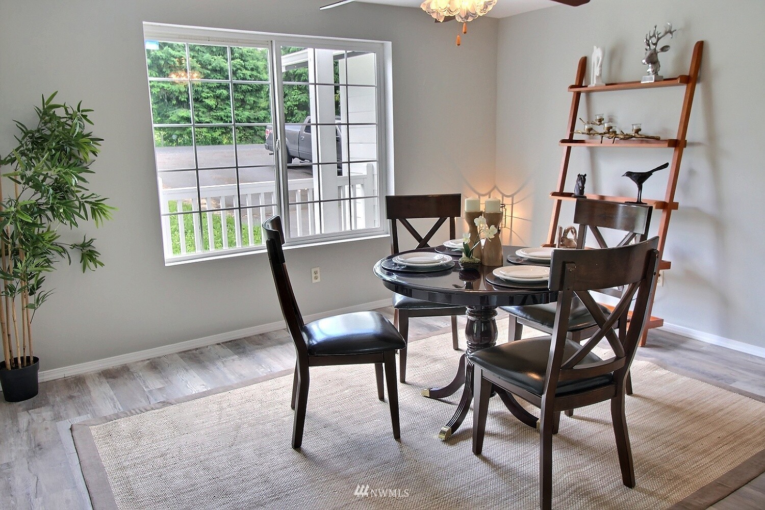 156 Elk Creek Road Chehalis, WA 98532 - Photo 13 of 39 a view of a dining room with furniture and a potted plant