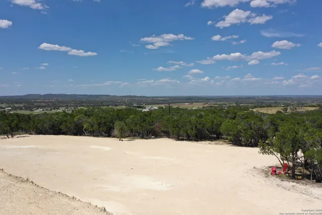 a view of fountain in front of a building