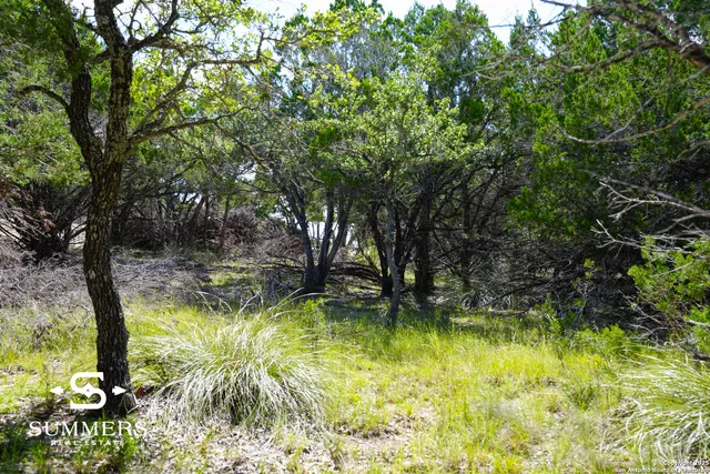 a view of swimming pool from a lake view