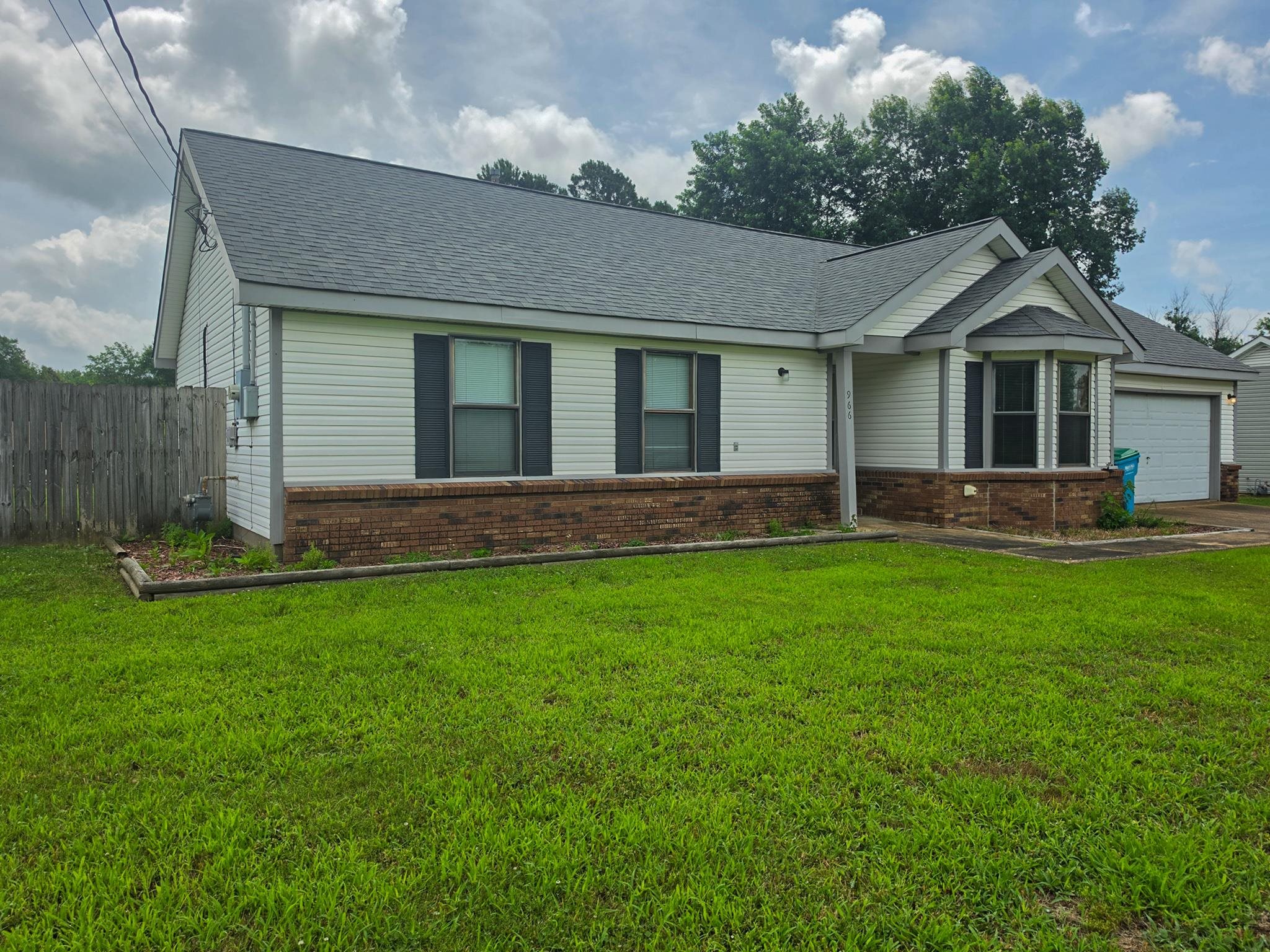 966 Beaver Road Munford, TN 38058 - Photo 2 of 32 Single-story residence featuring white siding and a dark shingle roof
