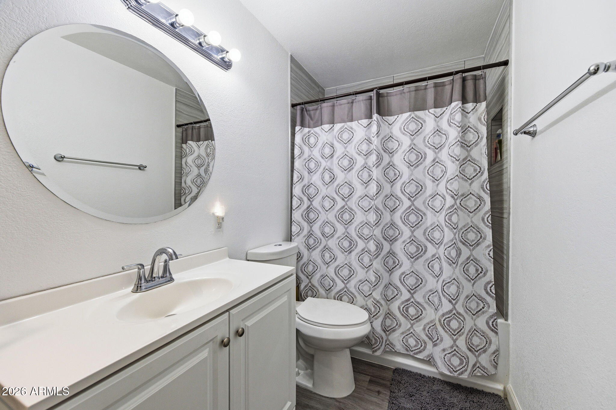 1268 East Rodeo Road Casa Grande, AZ 85122 - Photo 18 of 27 a bathroom with a sink and a mirror
