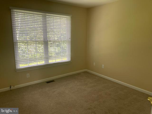 11 Tree Swallow Drive Princeton, NJ 08540 - Photo 18 of 29 a view of an empty room with a window