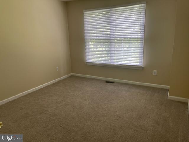 11 Tree Swallow Drive Princeton, NJ 08540 - Photo 20 of 29 an empty room with a window