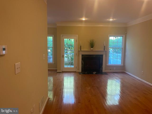 11 Tree Swallow Drive Princeton, NJ 08540 - Photo 5 of 29 a view of a livingroom with wooden floor and a fireplace