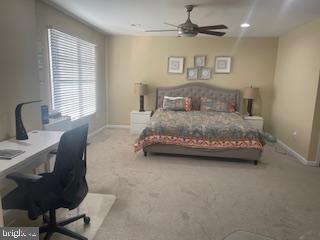 11 Tree Swallow Drive Princeton, NJ 08540 - Photo 10 of 29 a spacious bedroom with a bed a desk and chair