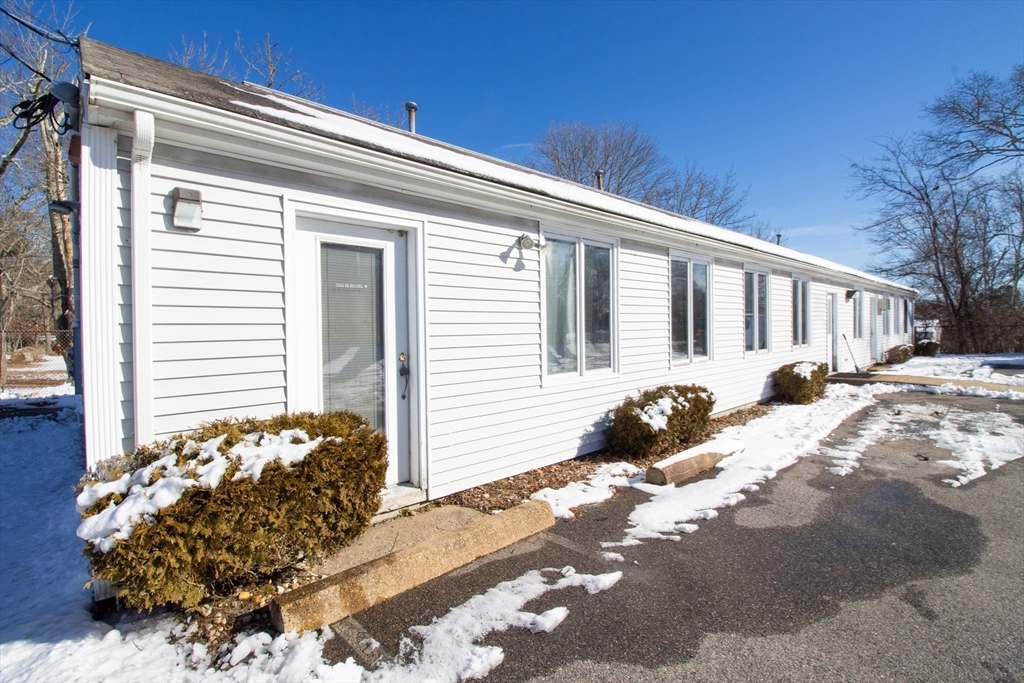 47 Sandwich Road Wareham, MA 02571 - Photo 4 of 22 a view of a house with a yard