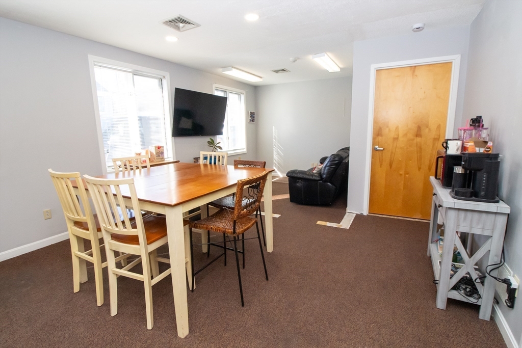 47 Sandwich Road Wareham, MA 02571 - Photo 7 of 22 a dining room with furniture and wooden floor