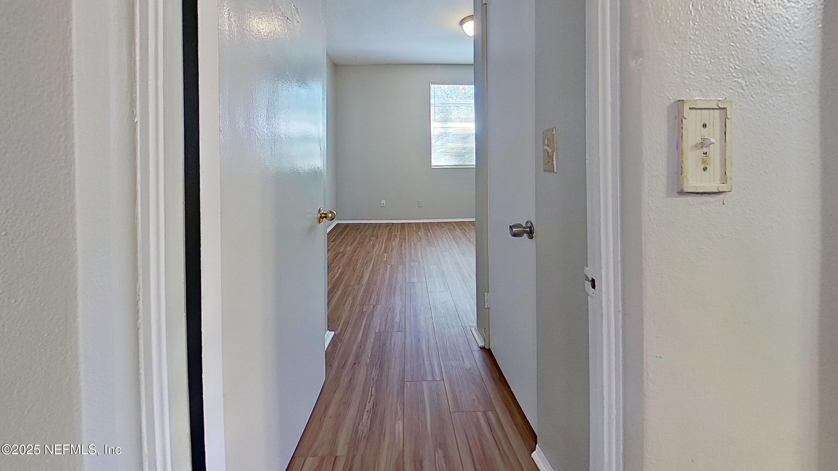 3034 Belden Street, Unit 3 Jacksonville, FL 32207 - Photo 7 of 13 a view of a hallway with wooden floor