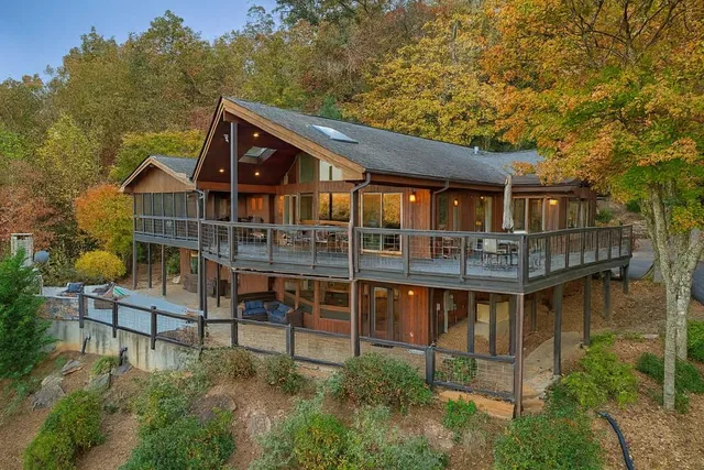 aerial view of house with a yard