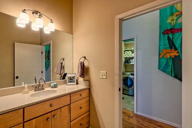 a lobby with furniture and wooden floor