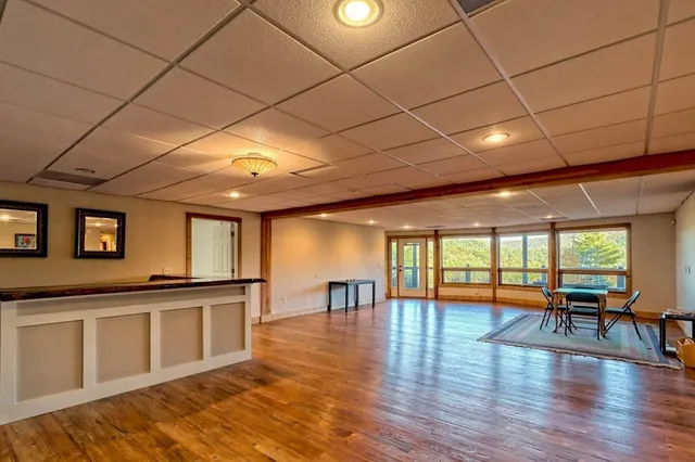 a bedroom with two beds and a closet