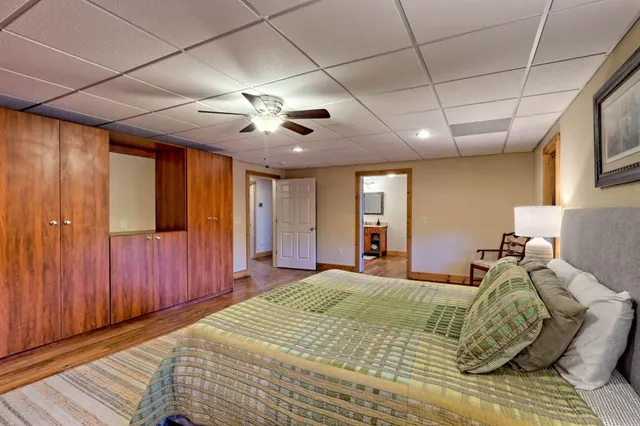 a building outdoor space with patio couch and glass windows