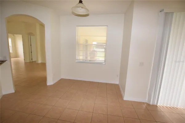 an empty room that has a window