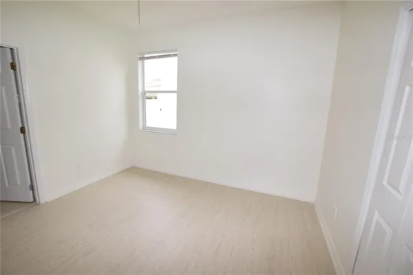 an empty room with a window
