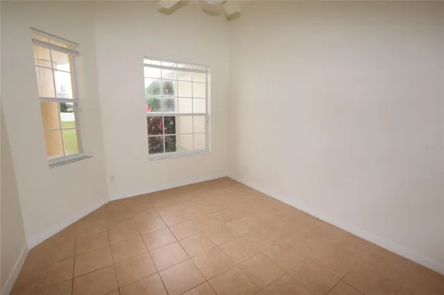 an empty room with windows