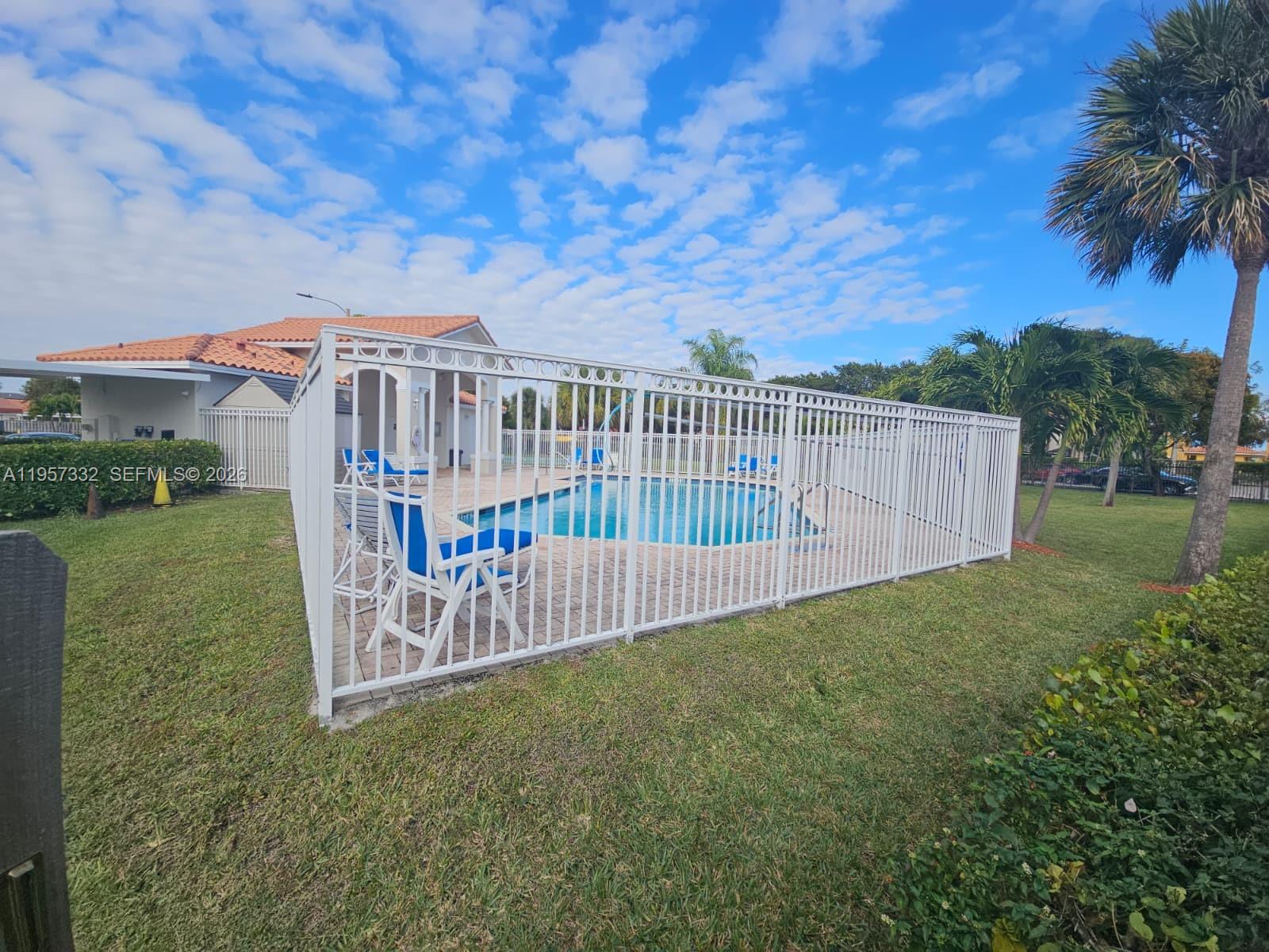 10919 Southwest 182nd Lane Miami, FL 33157 - Photo 11 of 29 a view of a house with a yard and deck