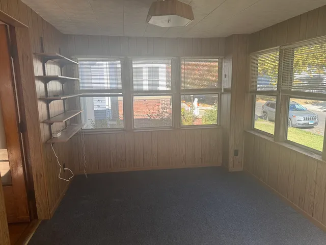 an empty room with windows