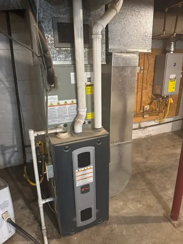 a view of a garage with a white car parked