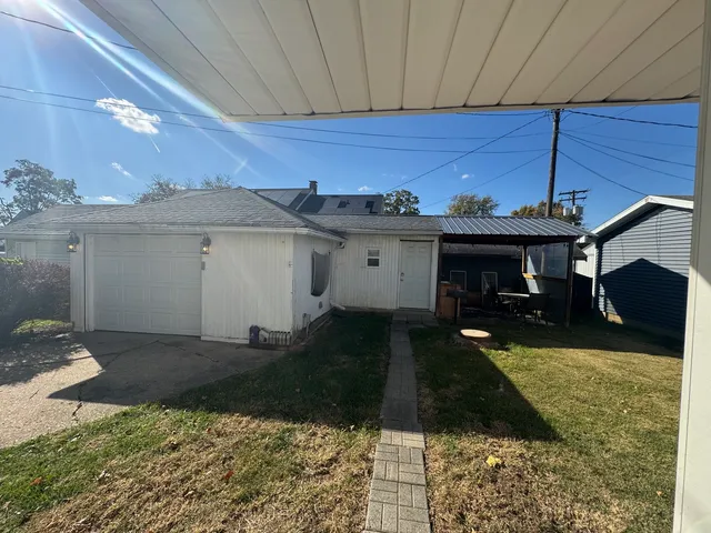 a view of a backyard of a house