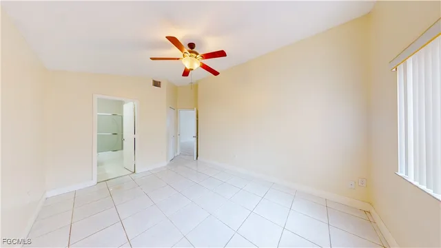 a bathroom with a bathtub sink vanity and mirror