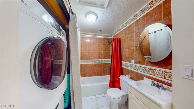 a bathroom with a toilet and a bathtub
