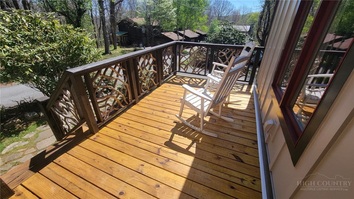 172 Yarrow Lane Boone, NC 28607 - Photo 27 of 30 a view of balcony with wooden floor and fence
