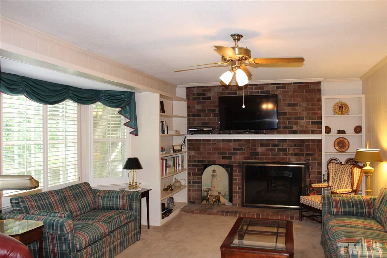 1502 Rogers Road Graham, NC 27253 - Photo 13 of 25 Den w/gas log fireplace and built-ins.
