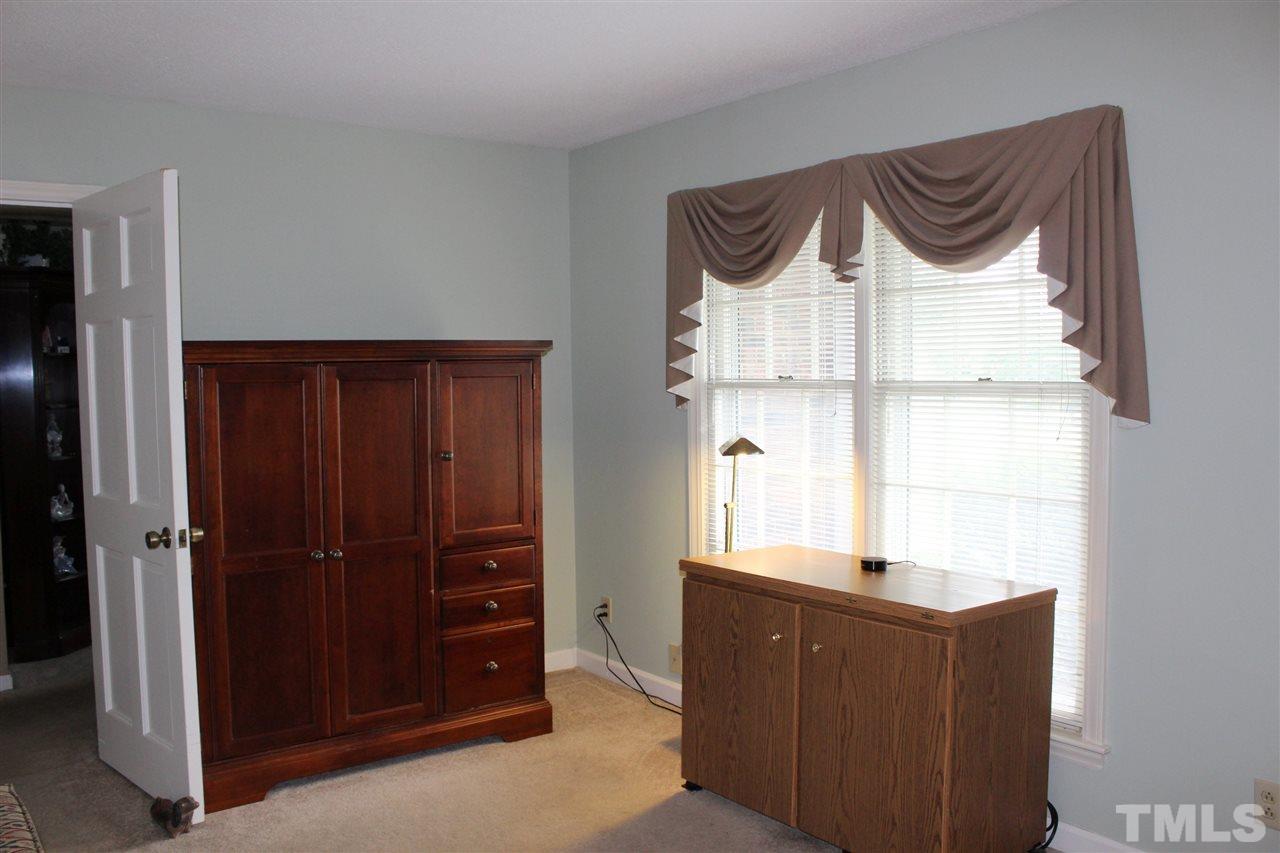 1502 Rogers Road Graham, NC 27253 - Photo 16 of 25 This main floor bedroom has a private bath.