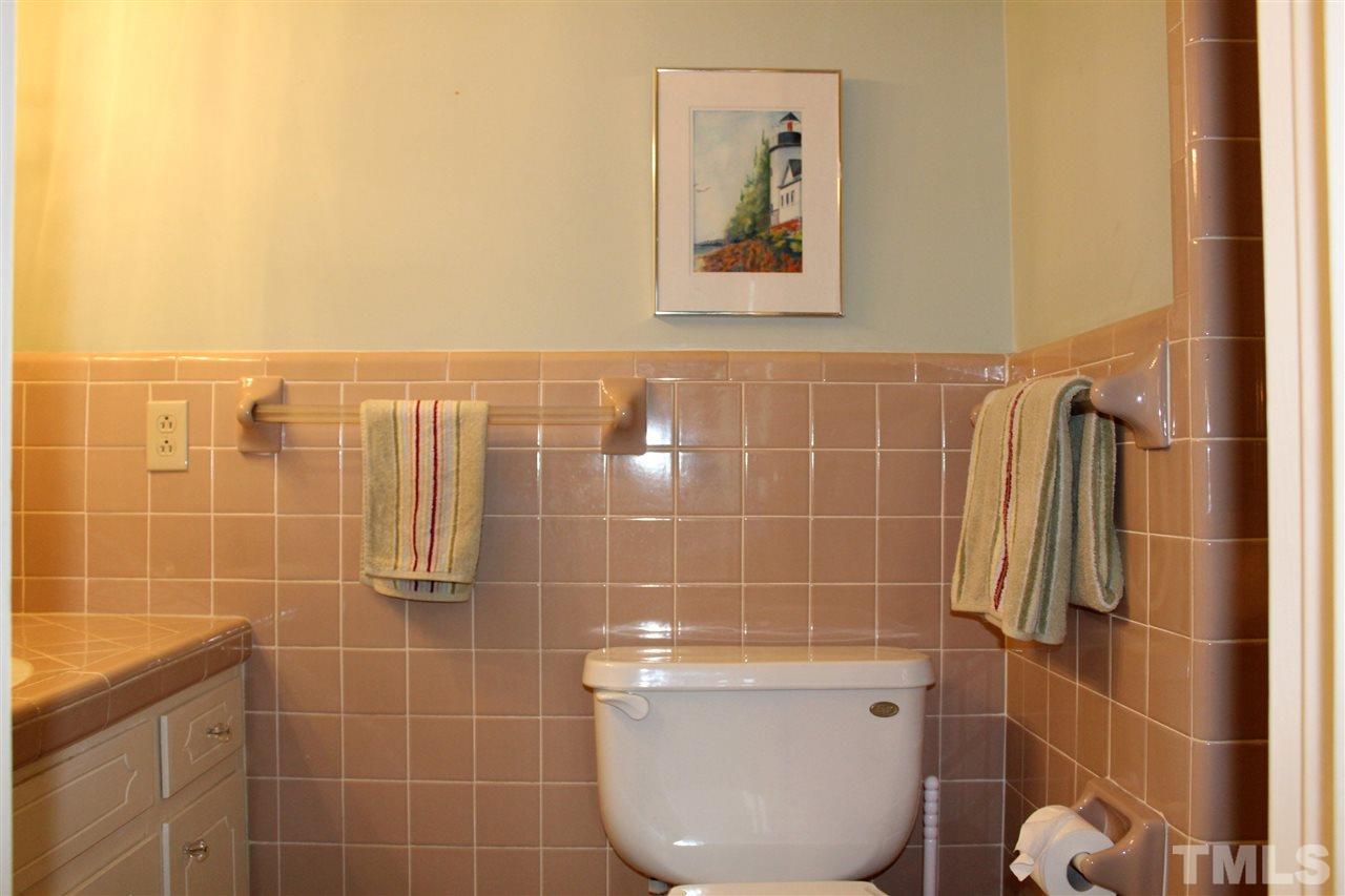 1502 Rogers Road Graham, NC 27253 - Photo 17 of 25 Tiled bath with shower for Bedroom 2 on main floor