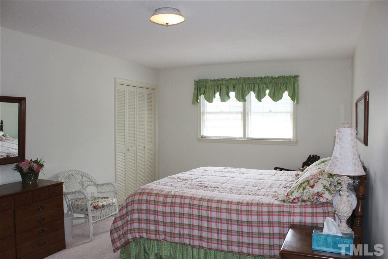 1502 Rogers Road Graham, NC 27253 - Photo 18 of 25 This second floor bedroom is large with bath and could be a guest suite or upstairs master.
