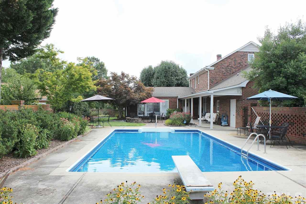 1502 Rogers Road Graham, NC 27253 - Photo 3 of 25 Rear Yard and in-ground pool.